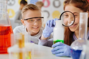 Cheerful girl examining